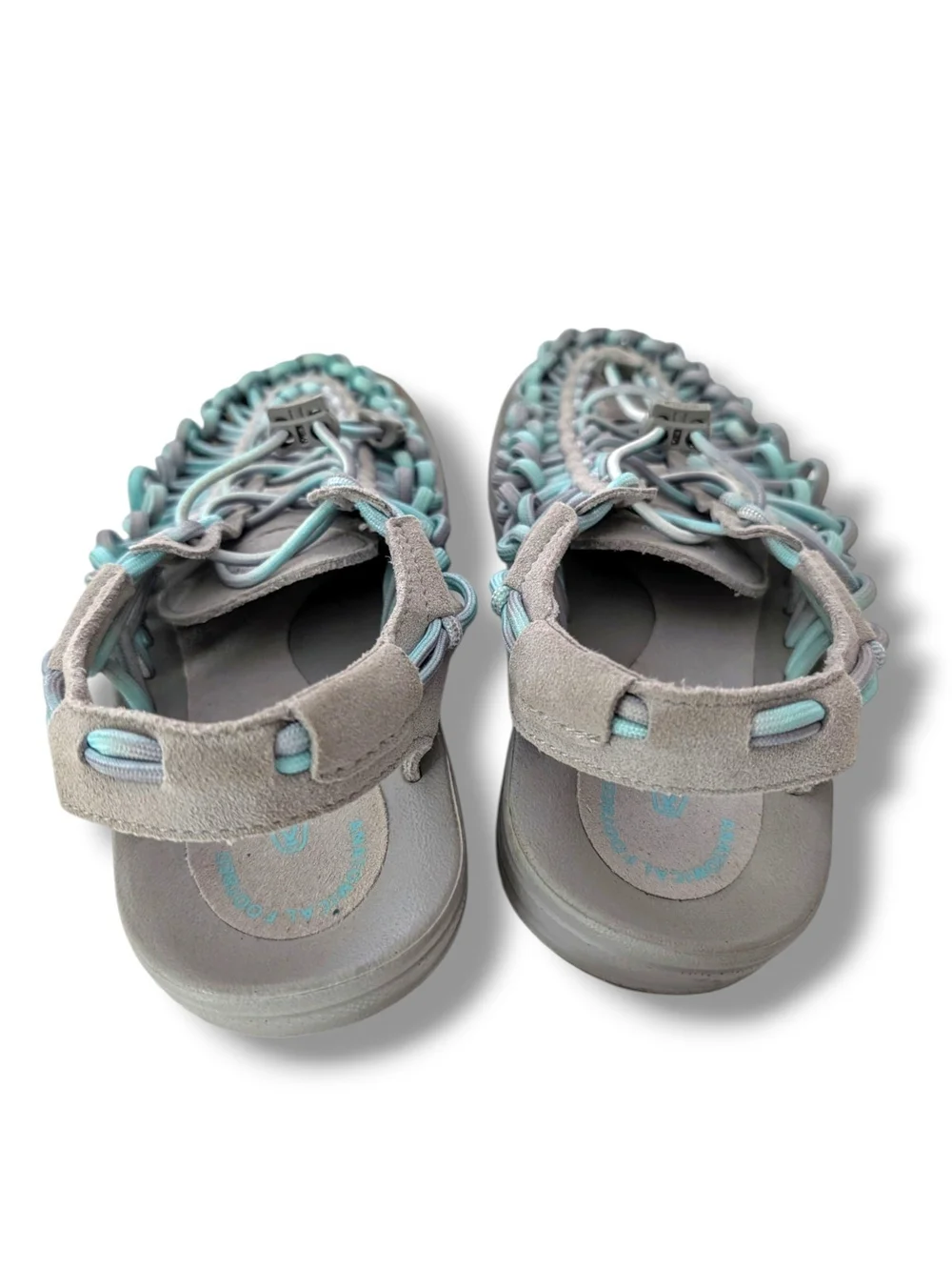 NWOT KEEN Women's Uneek open-air cord sandals in a grey and aqua blue colorway